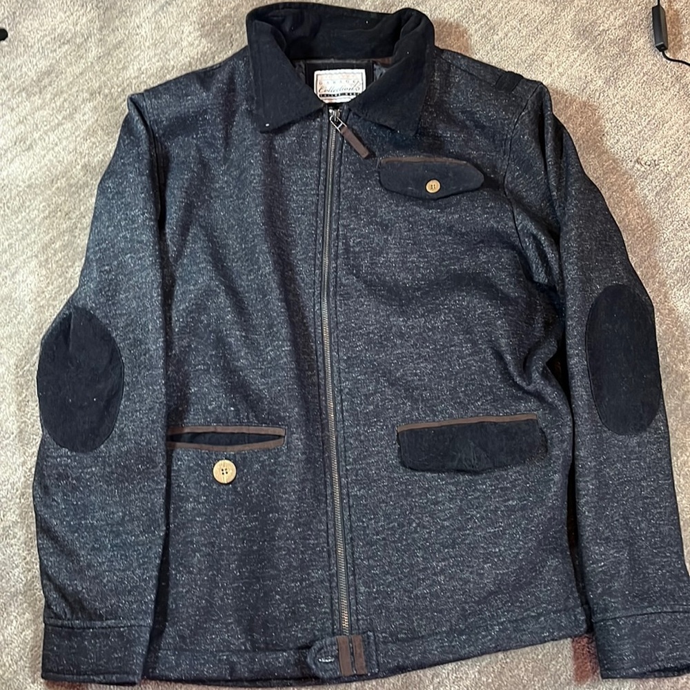 Dark grey Billabong jacket.